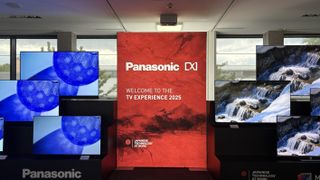 Panasonic TVs on a black show stand
