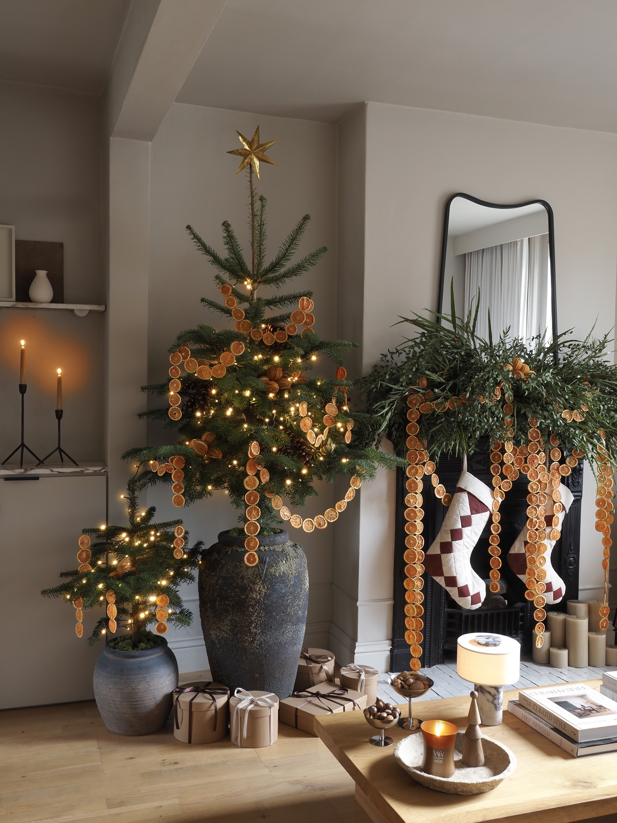 a christmas tree decorated with orange slice garlands