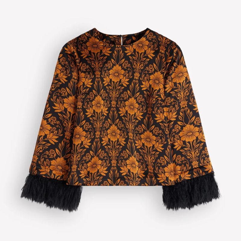 feathered trim sleeve top