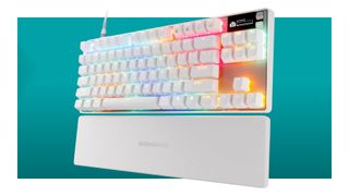 An image of a SteelSeries Apex Pro TKL Gen 3 keyboard against a teal background with a white border.