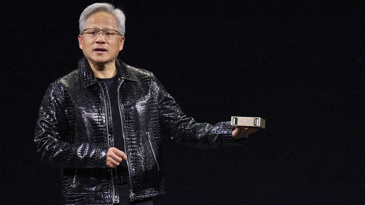 Nvidia CEO Jensen Huang holding the Project Digits mini PC during the 2025 CES event in Las Vegas, Nevada, US, on Monday, Jan. 6, 2025.