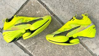 I ran in the Puma Fast RB a radical rule breaking carbon racing shoe with three plates Tom s Guide