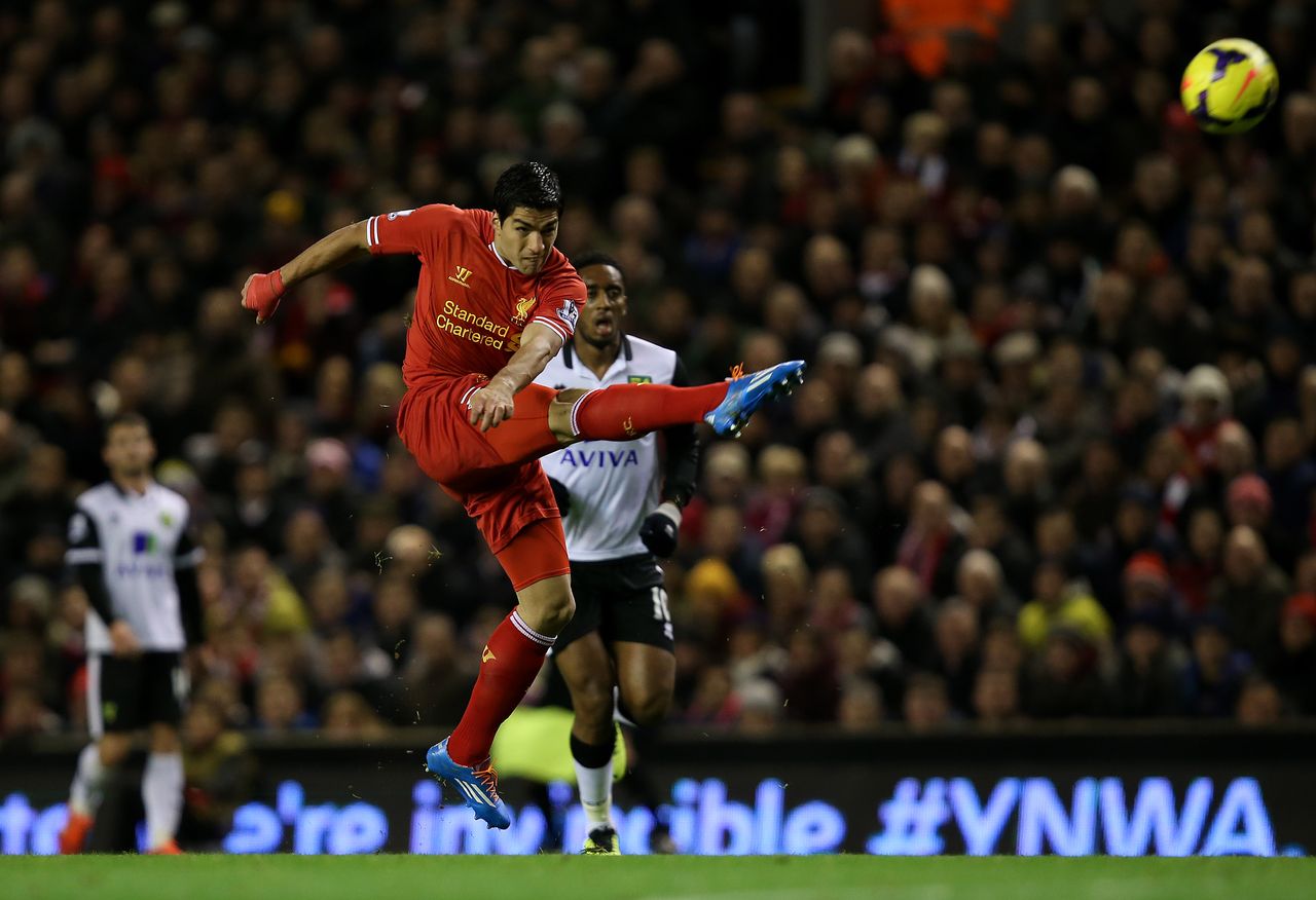 Luis Suarez scores an unbelievable goal for Liverpool against Norwich in December 2013.