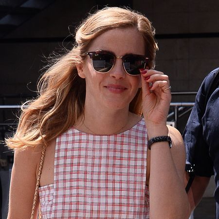 Emma Watson at the Cannes Film Festival wearing a plaid dress