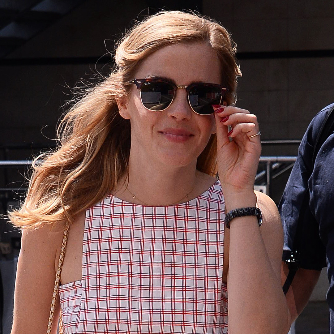 Emma Watson at the Cannes Film Festival wearing a plaid dress