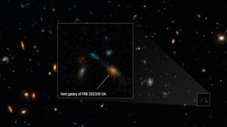deep-sky image of dozens of distant galaxies captured by the hubble space telescope
