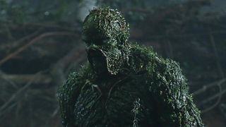 A green veined monster looms towards the camera, it's The Swamp Thing!