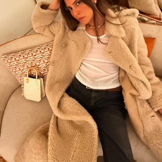 woman wearing cream coat outfit 2026