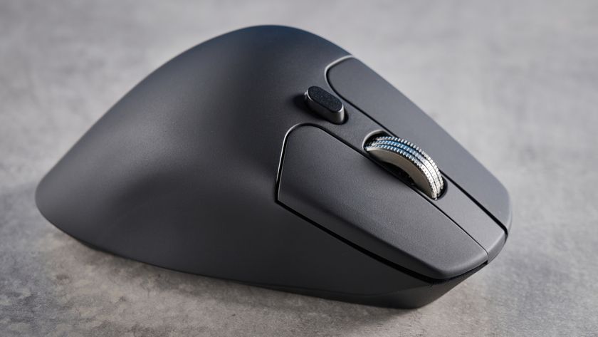 A black Keychron M6 8K ergonomic mouse