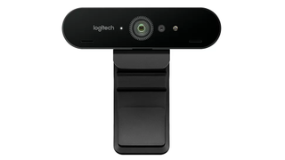 Black Logitech Brio Webcam facing forwards on white background