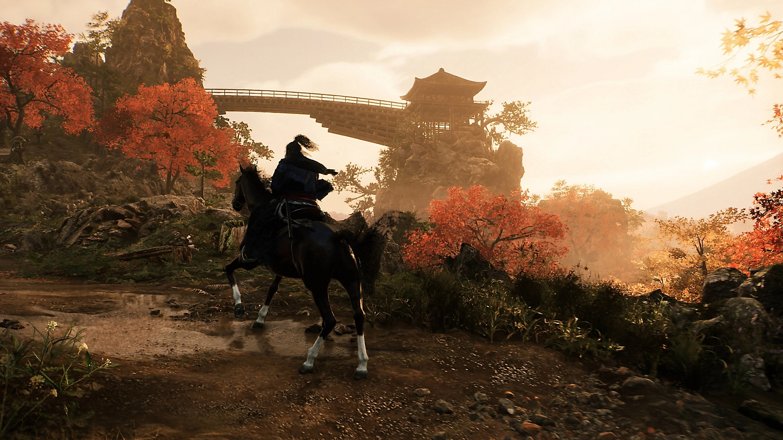 A character riding their horse through the Japanese landscape of in Rise of the Ronin