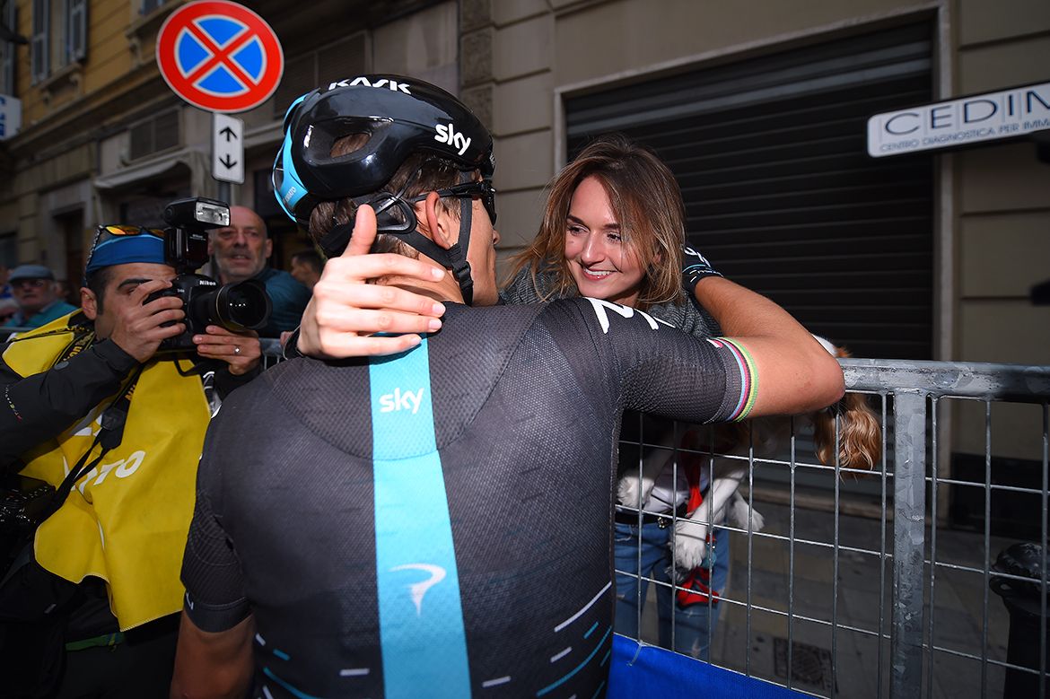 Michal Kwiatkowski is congratulated by his partner