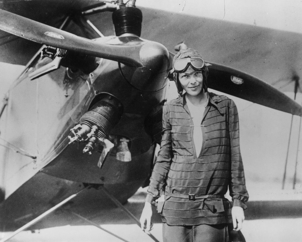 Amelia Earhart stands in front of her biplane called Friendship on June 14, 1928, in Newfoundland. 