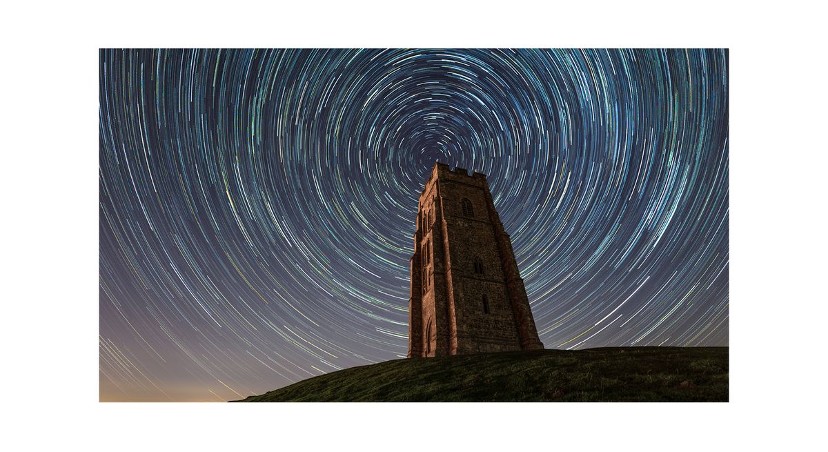 Star trails around Glastonbury Tor in Somerset, England, captured by astrophotographer Josh Dury