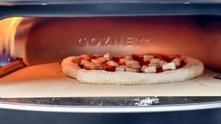 Gozney Arc pizza oven cooking a pizza