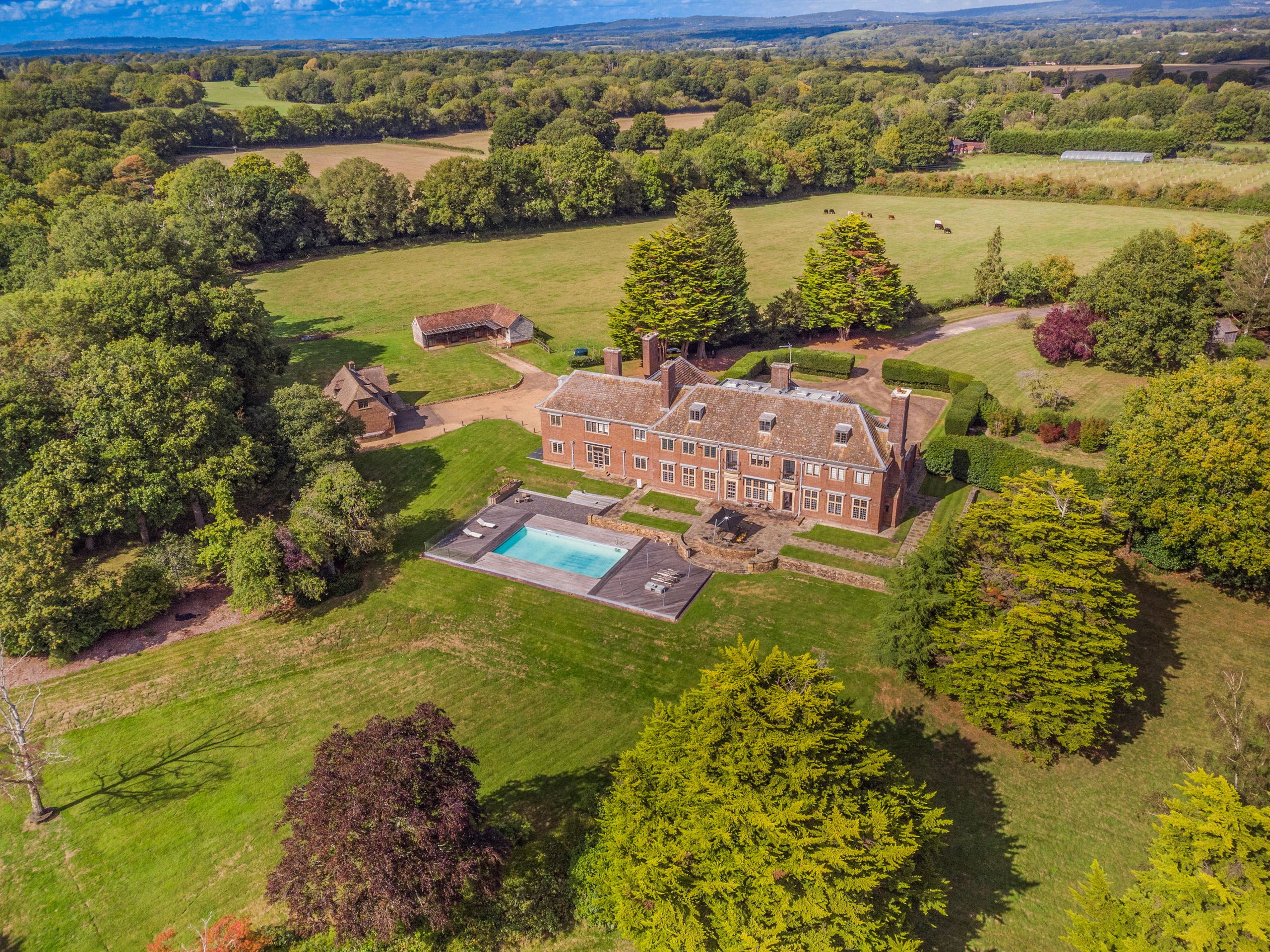 The Sussex mansion of a member of one of the biggest bands of the 80s is for sale, and it's an Art Deco delight