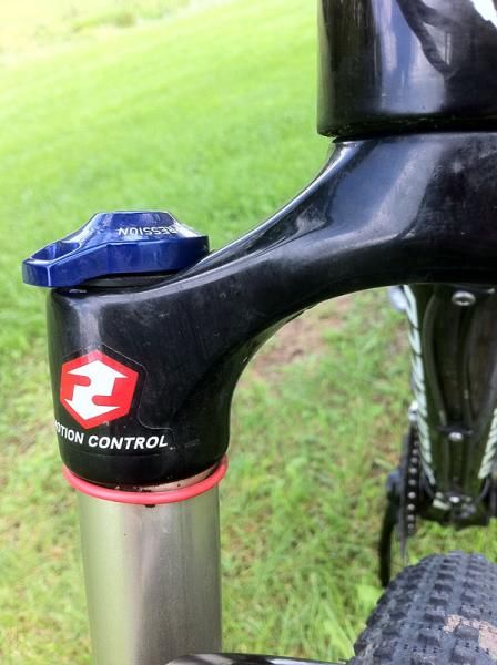 The RockShox Reba RL 29er fork has an adjustable lockout