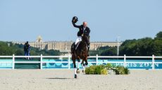 Michael Jung has won a record third individual Olympic eventing gold medal.