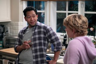 Eugene Cordero as Joel, Mary Elizabeth Ellis as Emily in episode 103 of A Man on the Inside.