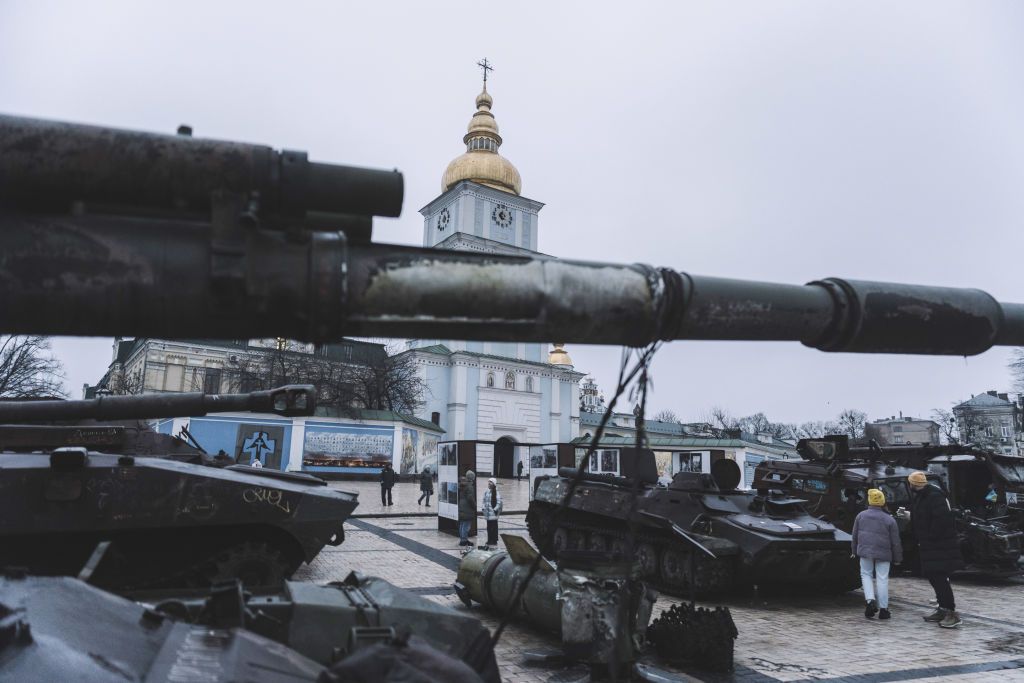 Visitors browse an exhibit of destroyed Russian military equipment and vehicles outside St. Michael&#039;s Golden-Domed Monastery in Kyiv, Ukraine