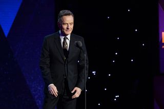 Bryan Cranston presents an award onstage during the 12th Annual CNN Heroes: An All-Star Tribute at American Museum of Natural History on December 9, 2018 in New York City.