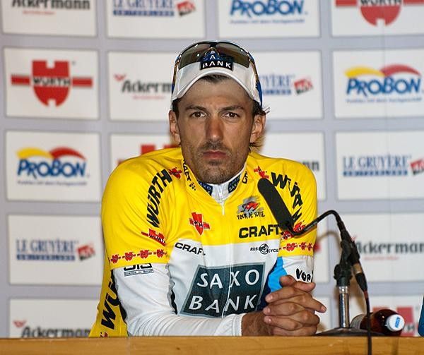 Why so glum, Fabian? Cancellara fields questions at the post-stage press conference.