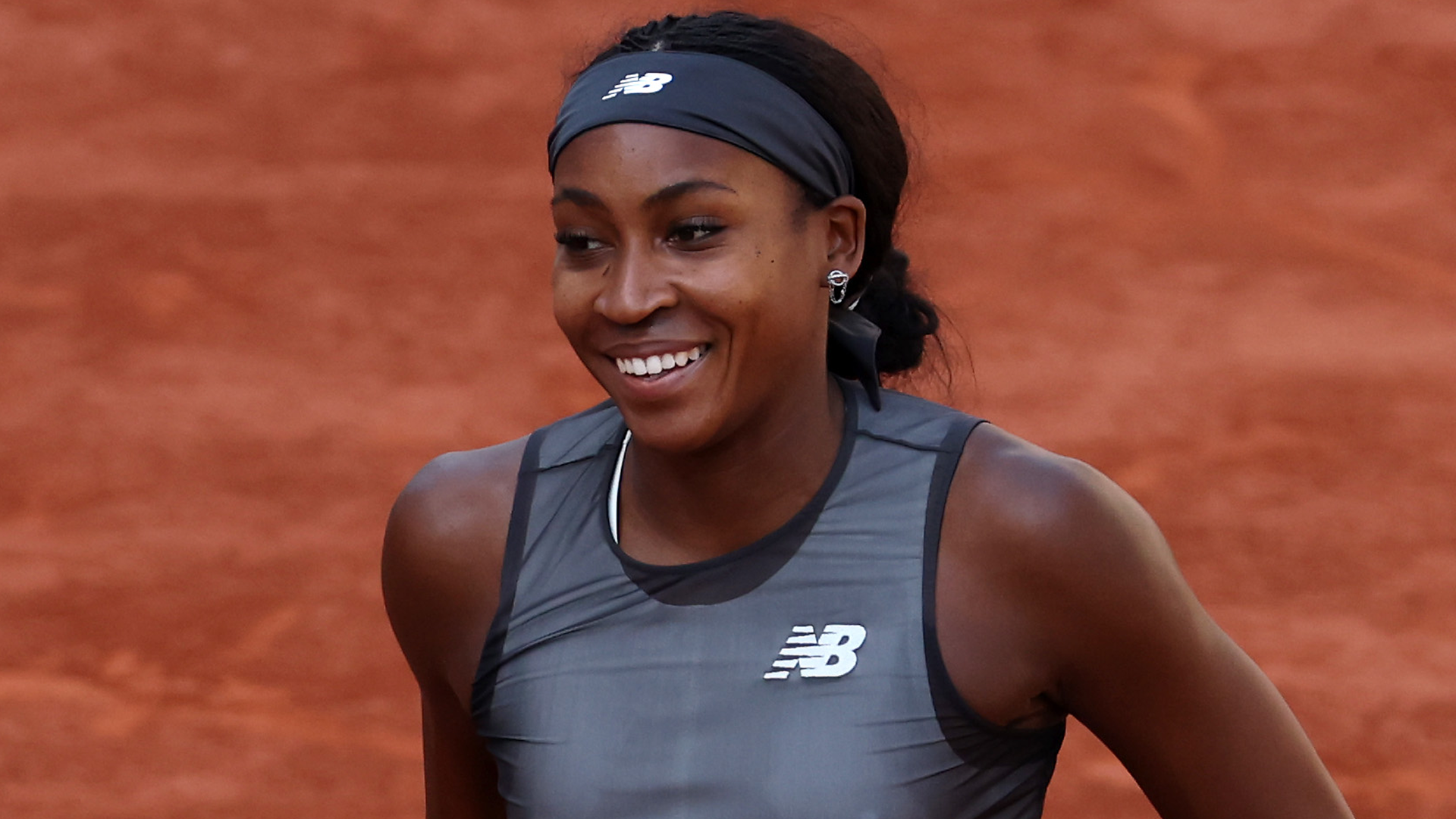 Coco Gauff wore a custom tennis dress from New Balance, alongside chunky sneakers at the 2026 French Open