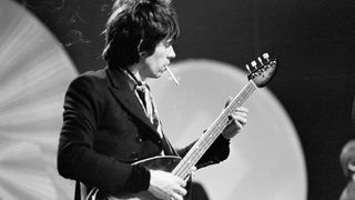 Keith Richards playing bass
