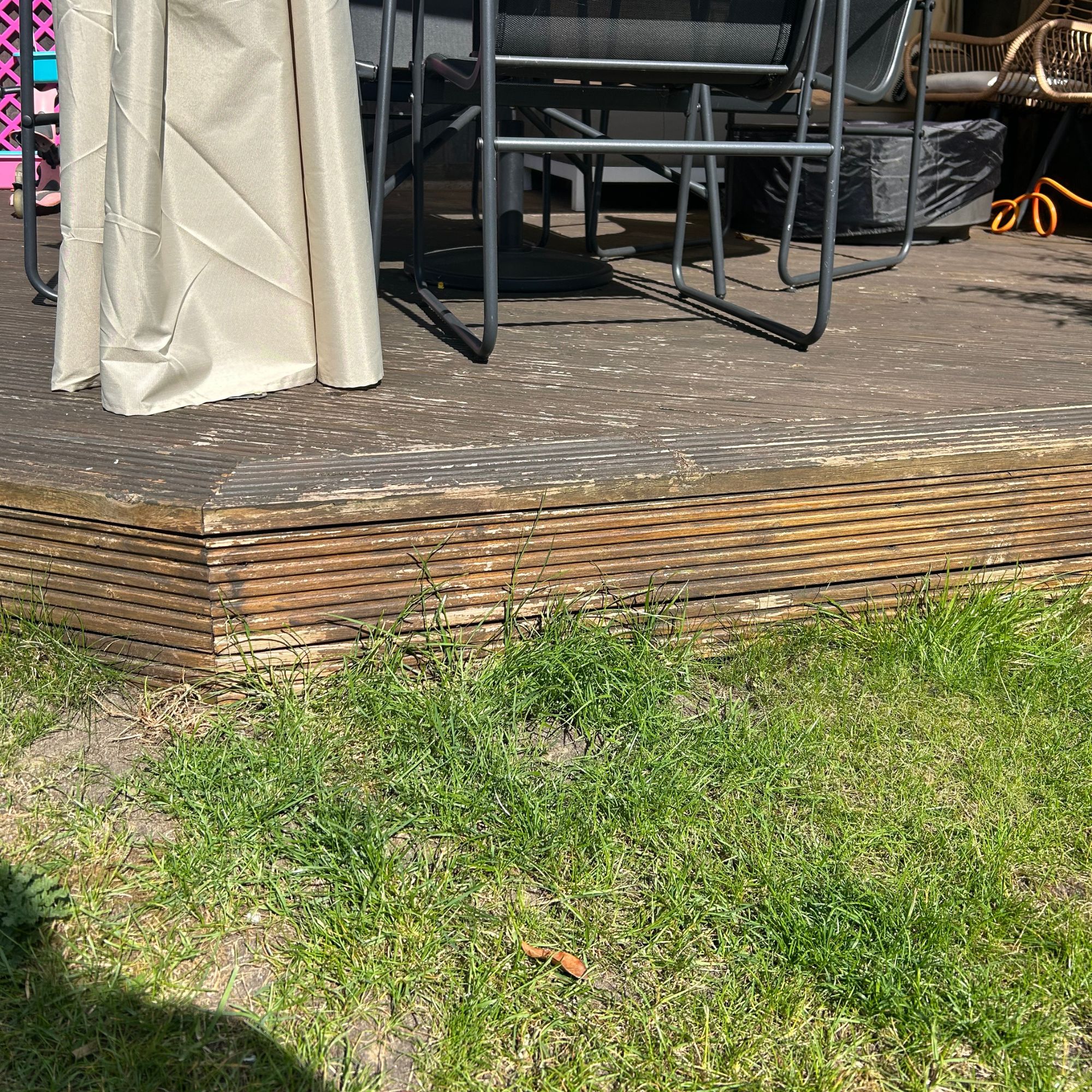 Before mowing around decking edges