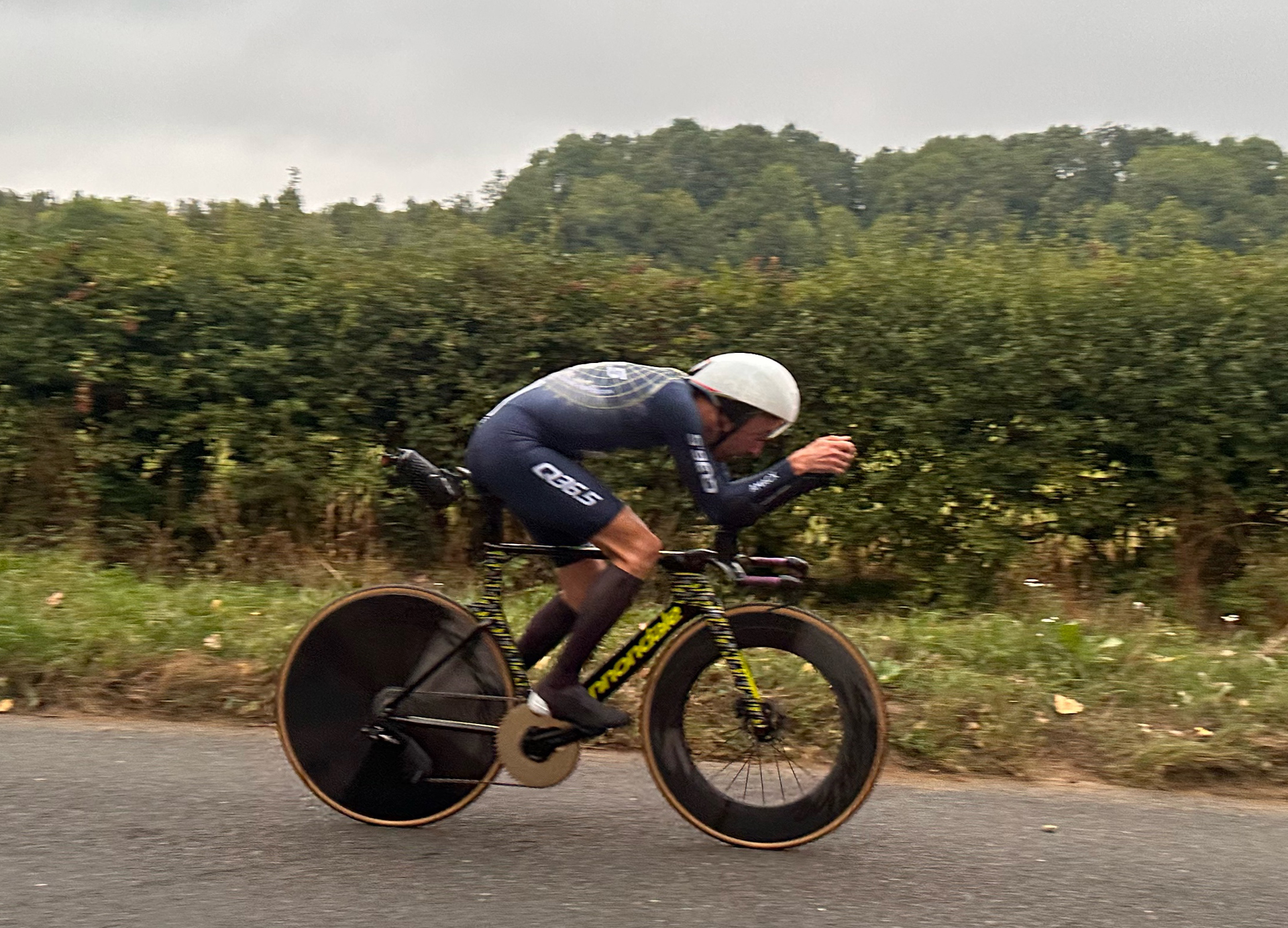 Action shot of author Aaron Borrill riding the Scribe Tempus Disc/100 wheelset in a time trial race