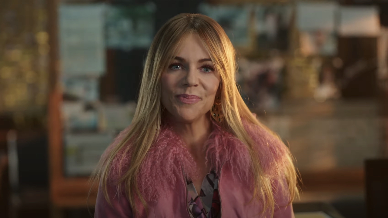 Kaitlin Olson's Morgan wearing fluffy pink jacket in ABC's High Potential