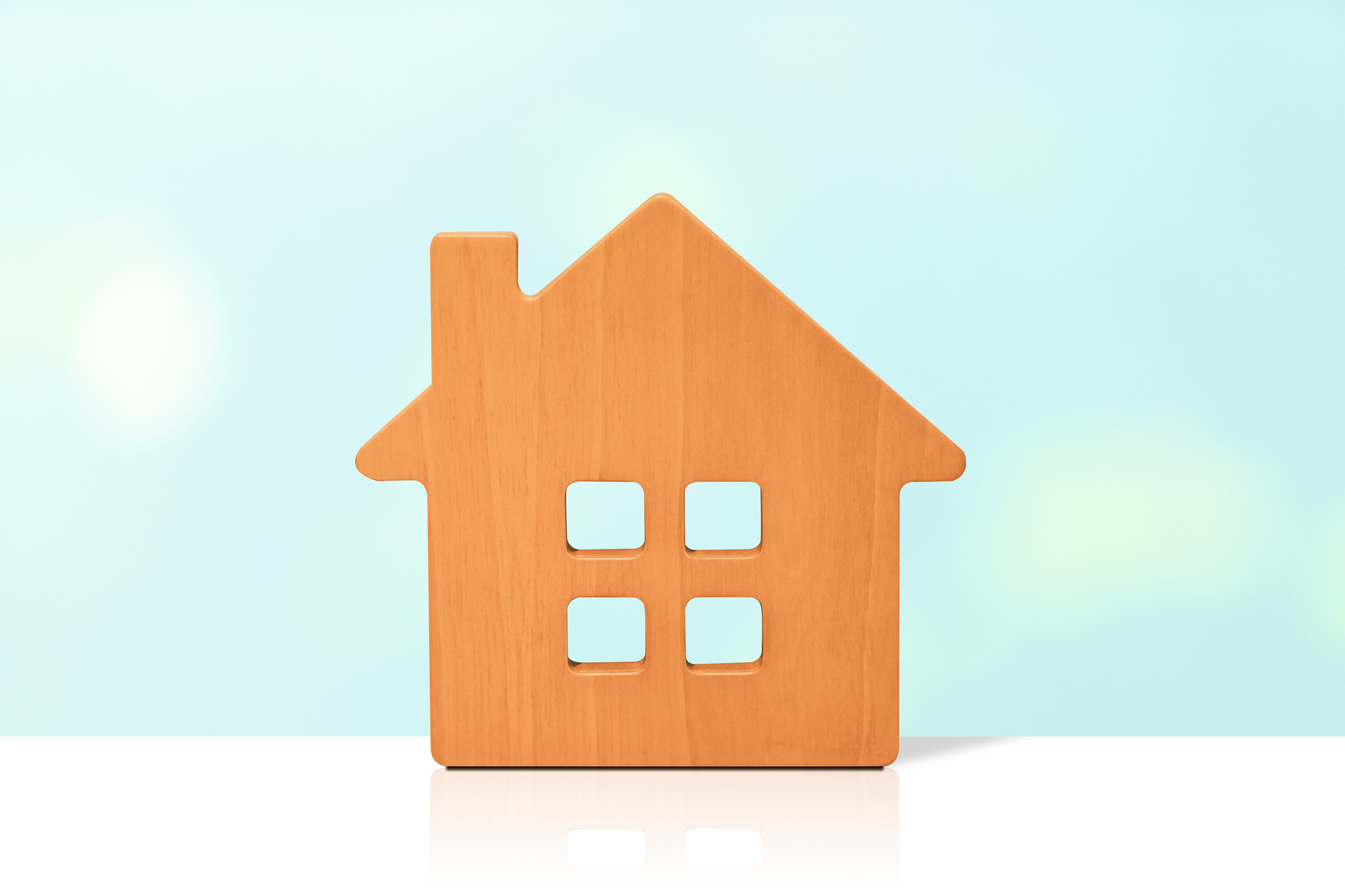 rendering of a wooden house with four windows
