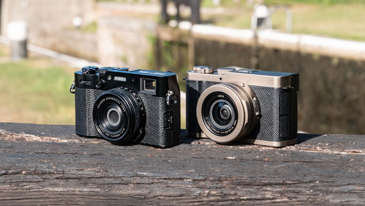 Fujifilm X100VI premium compact camera alongside the Panasonic Lumix L10 on a lock in a UK canal