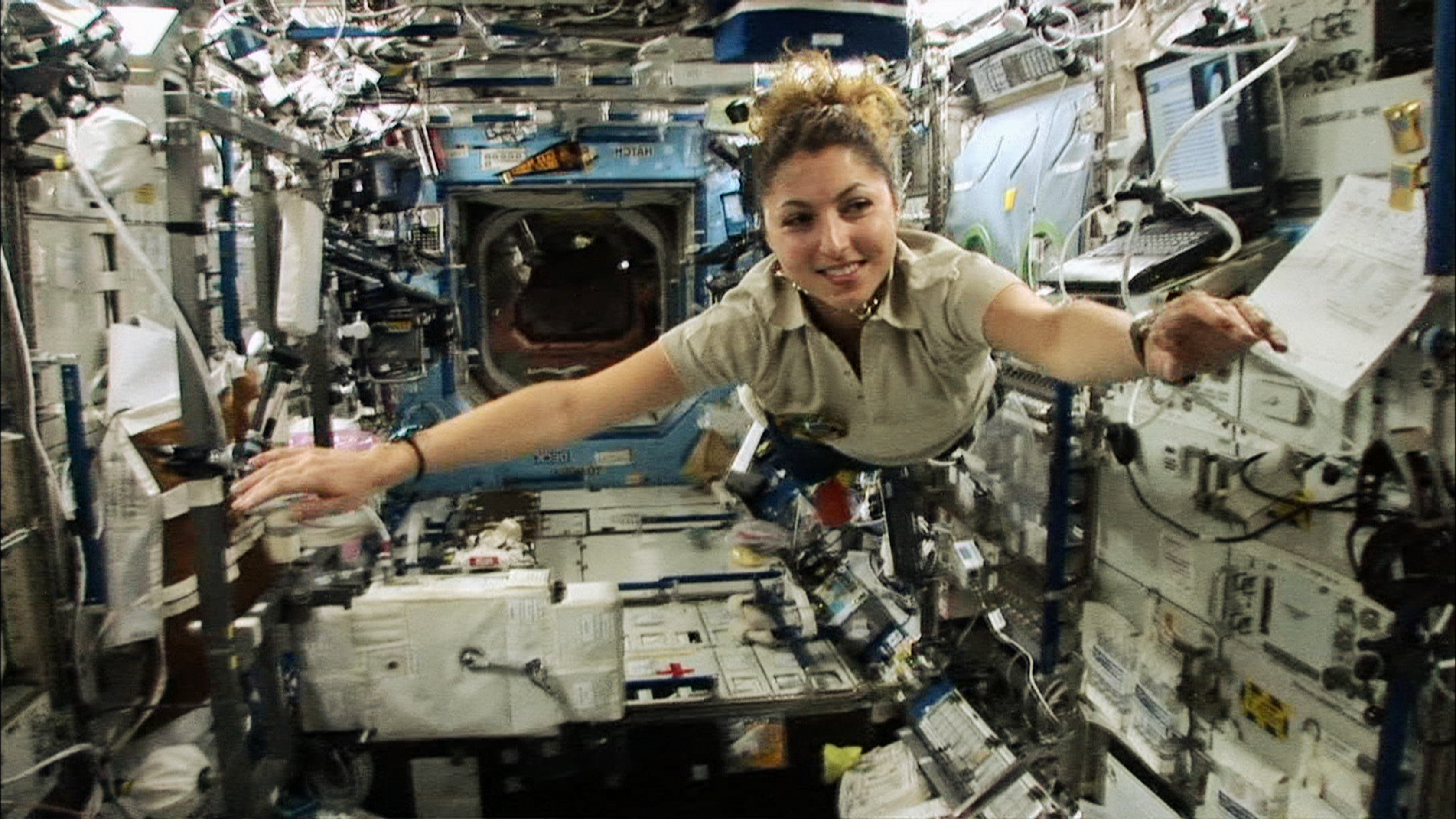 Anousheh Ansari floats through the International Space Station.