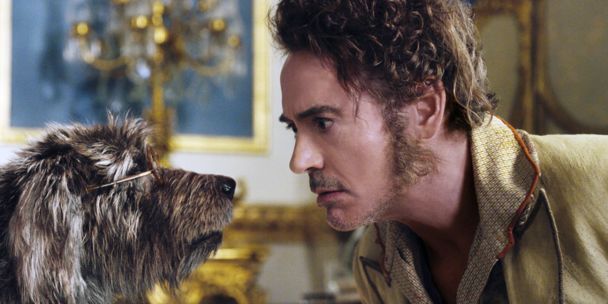 Dolittle Robert Downey Jr. looking at a dog in confusion