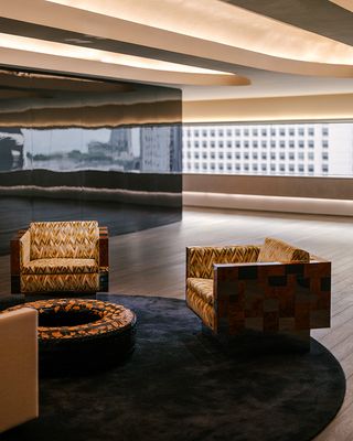 Hong Kong brutalist inspired office by Brewin waiting area seating