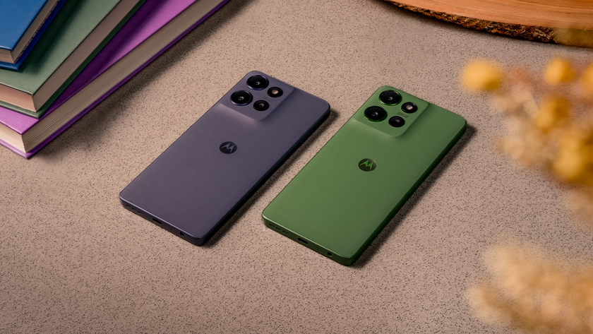 The Moto G Power 2025 in Slate Gray and Leaf Green lying flat on a table next to each other