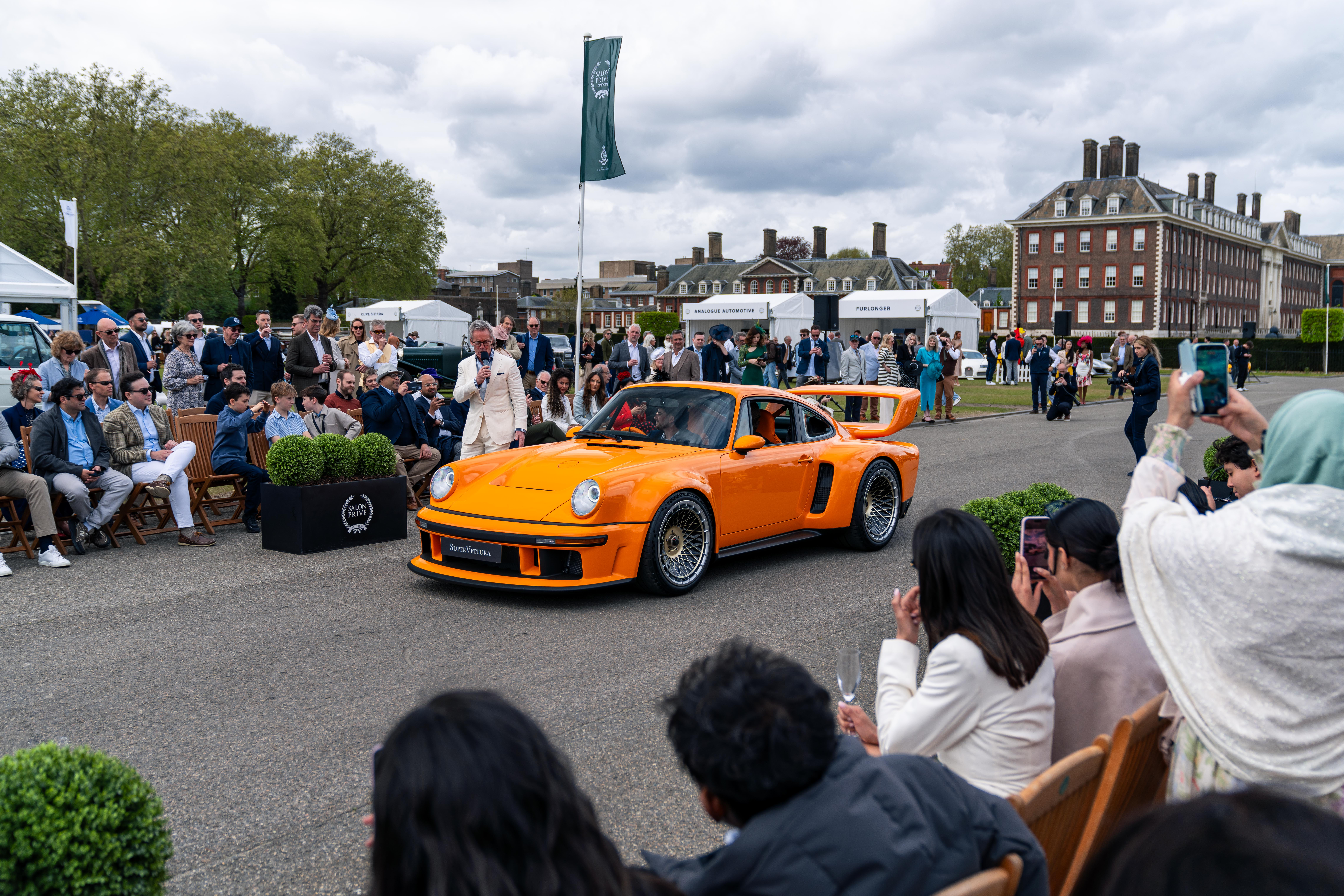 An orange singer porsche