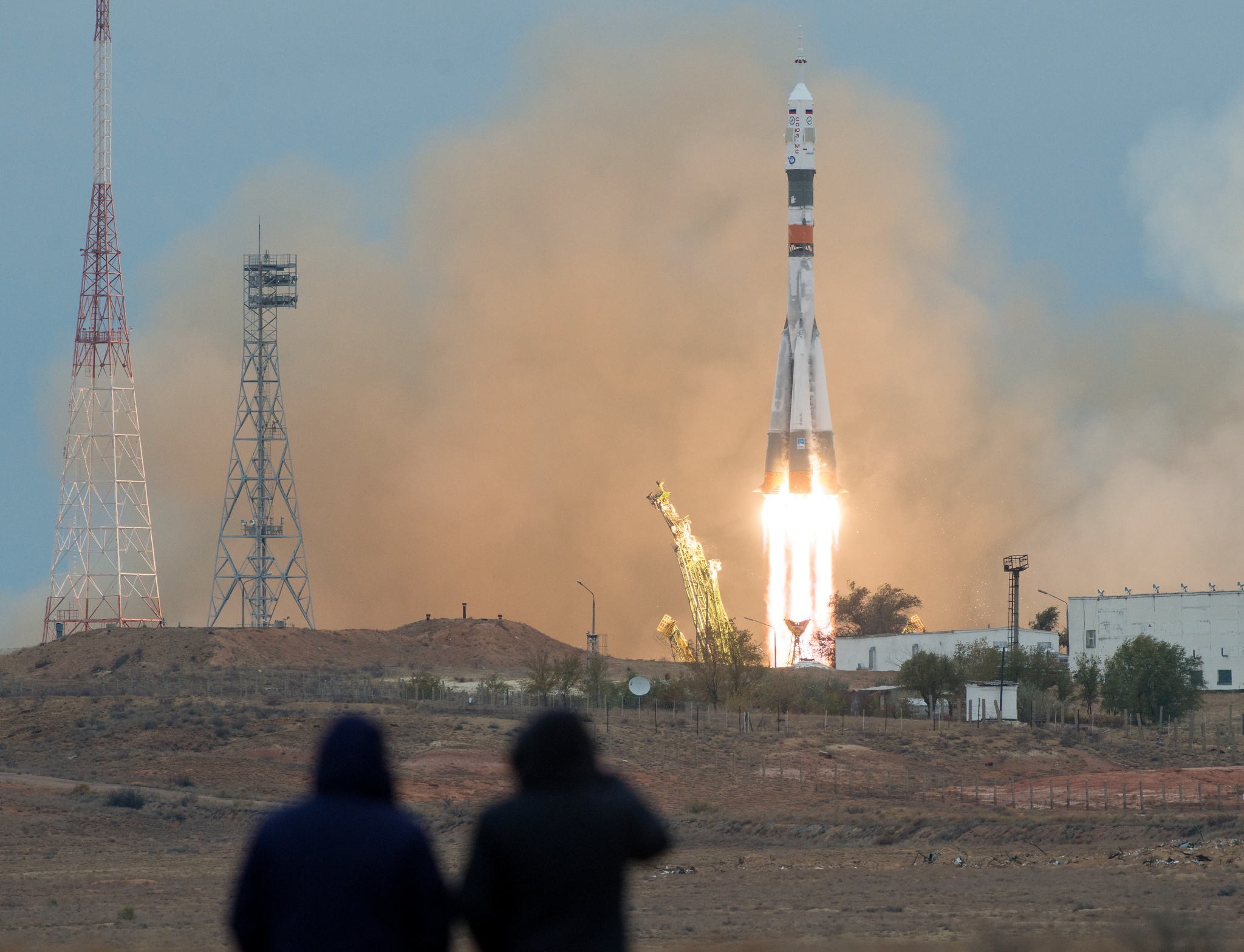 Spectactors watch as a Soyuz MS-02 rocket is launched with Expedition 49 Soyuz commander Sergey Ryzhikov of Roscosmos, flight engineer Shane Kimbrough of NASA, and flight engineer Andrey Borisenko of Roscosmos, Wednesday, Oct. 19, 2016 at the Baikonur Cos