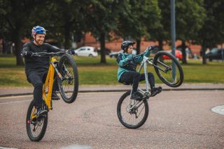 Danny MacAskill and friend doing wheelies