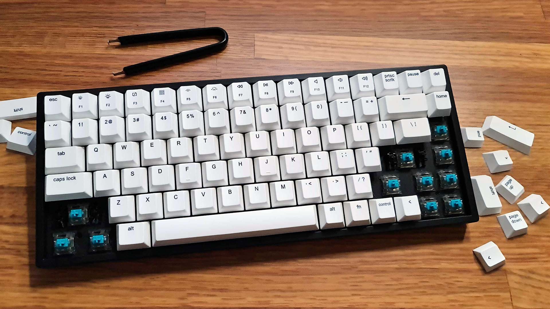 Vissles V84 gaming keyboard on a desk with keycaps removed