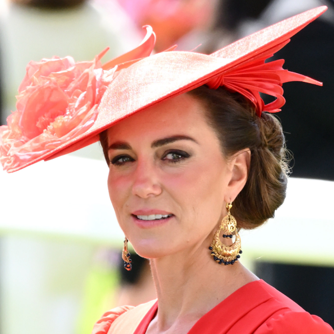 Kate Middleton wears a bright red hat and matching dress at Royal Ascot
