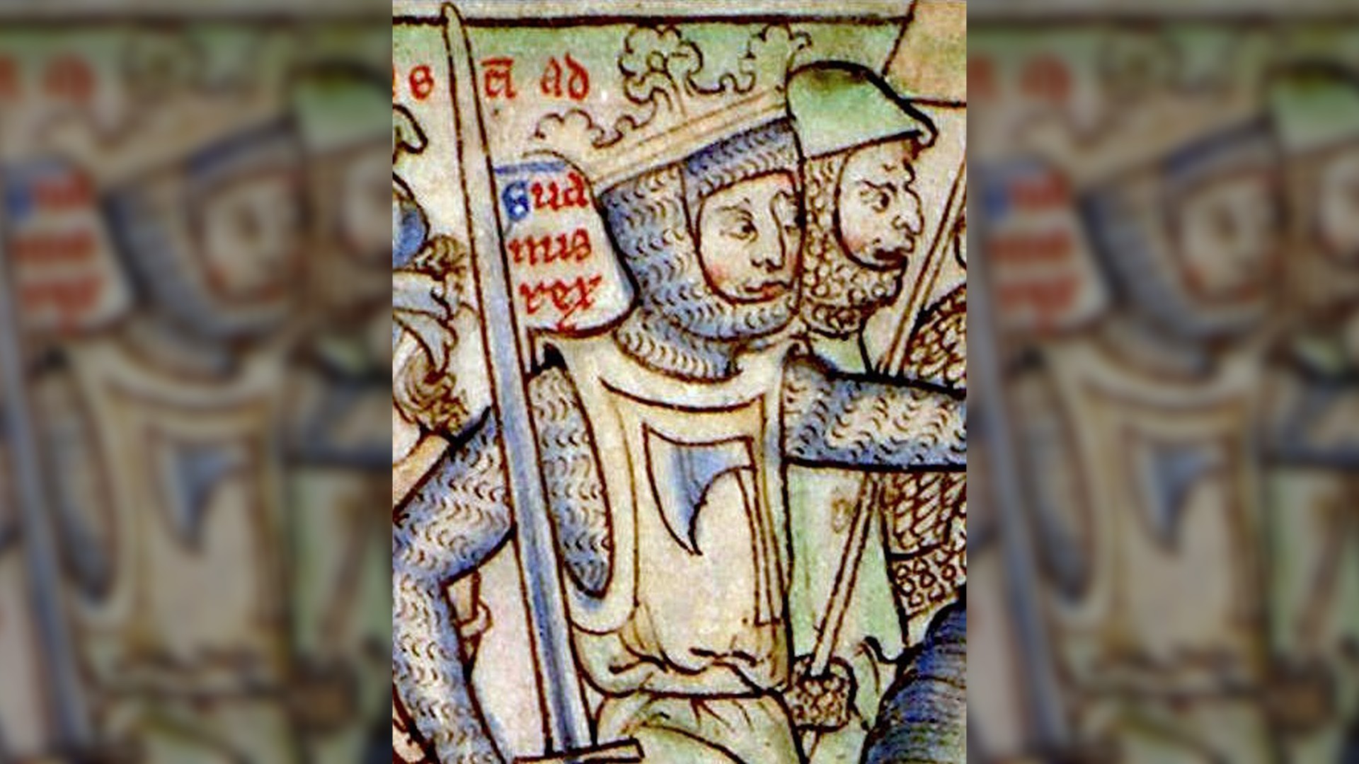 Portrayal of Sweyn Forkbeard.  He is wearing chain mail, a crown, a white tabard and an axe.