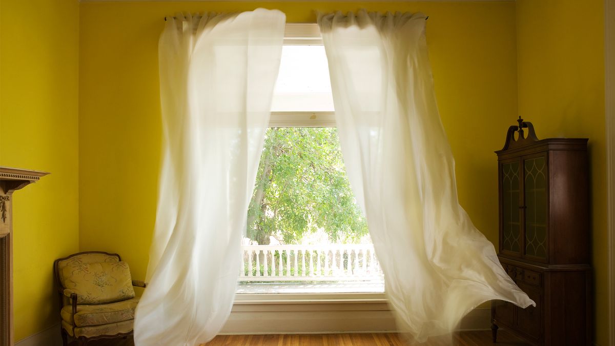 How to measure the air quality in your home: image of fresh air through windows