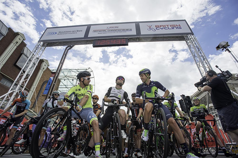 Tinkoff's Adam Blythe, Dimension Data's Mark Cavendish &amp; Movistar's Alex Dowsett prepare to start.