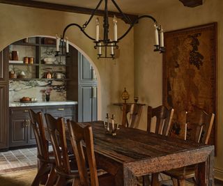 Textured limewash walls in a vintage-inspired dining room