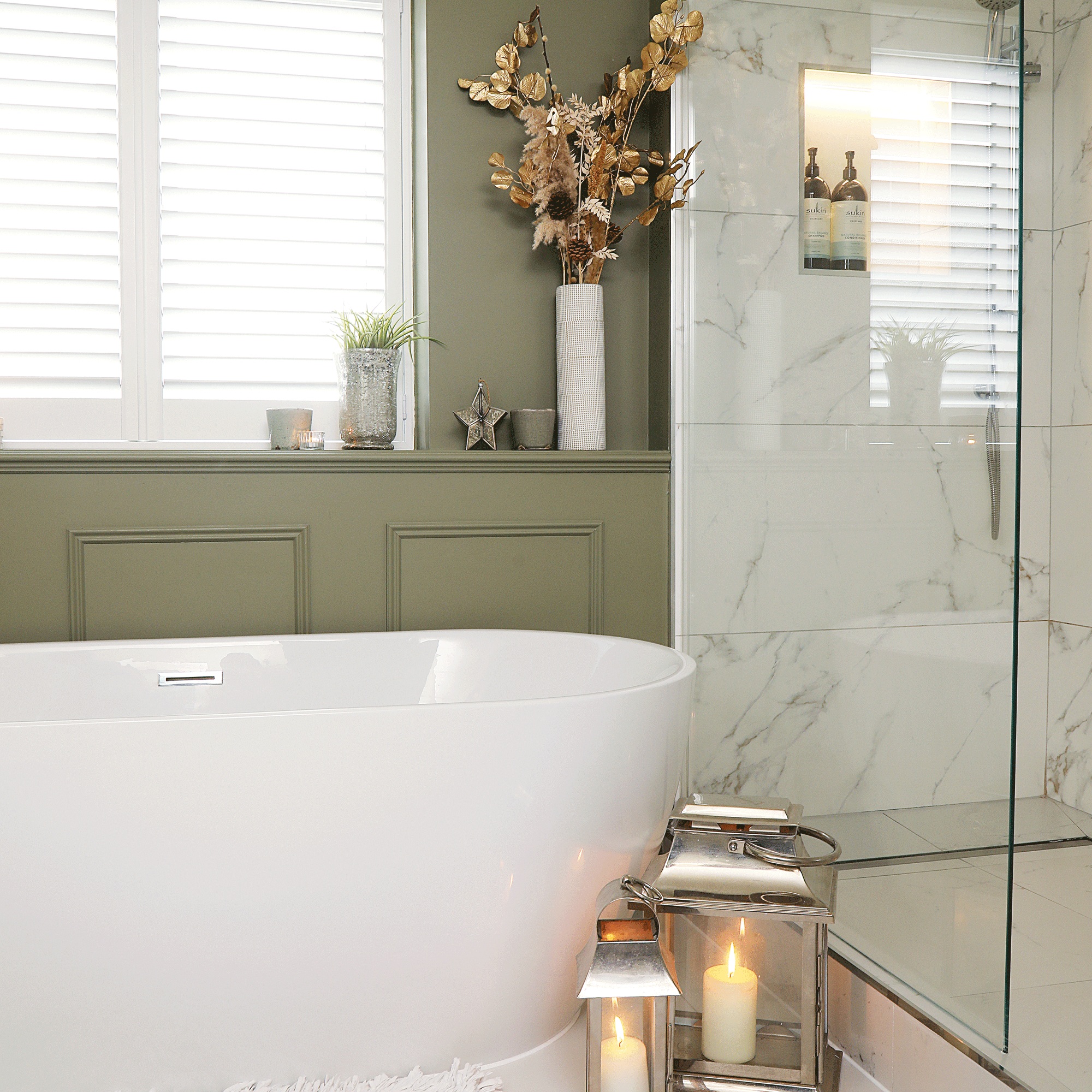 a bathroom with a large contemporary bath and shower area