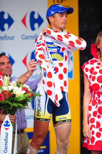 Johnny Hoogerland (Vacansoleil) dons his jersey