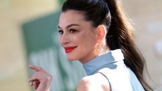 Anne Hathaway just solved the summer-to-autumn nail dilemma with this chic 'coconut jelly' shade - and it's so affordable