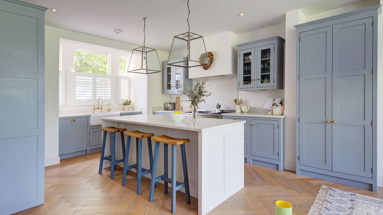 kitchen area with blue cabinets and drawers